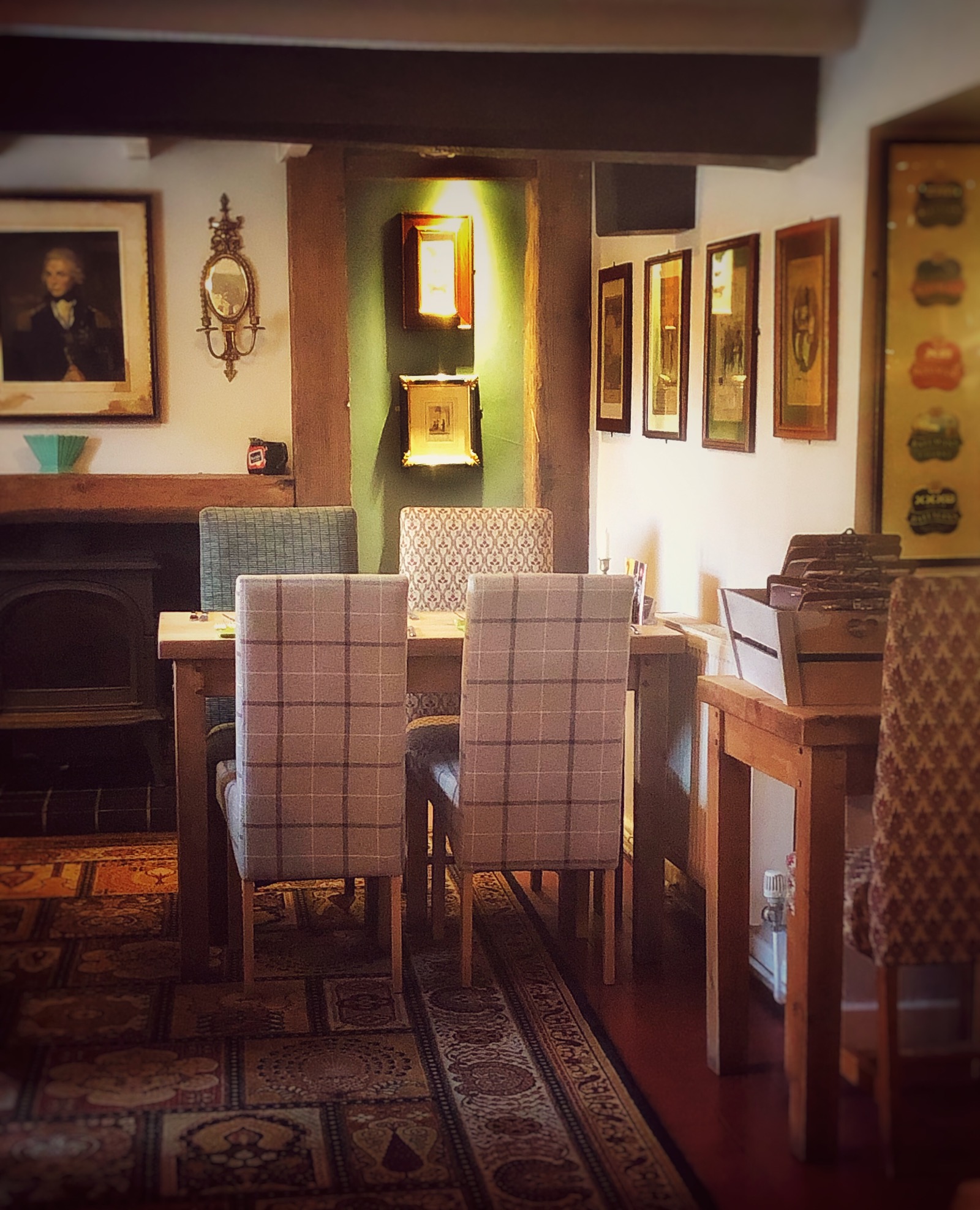 Cosy village pub table and chair woodburner